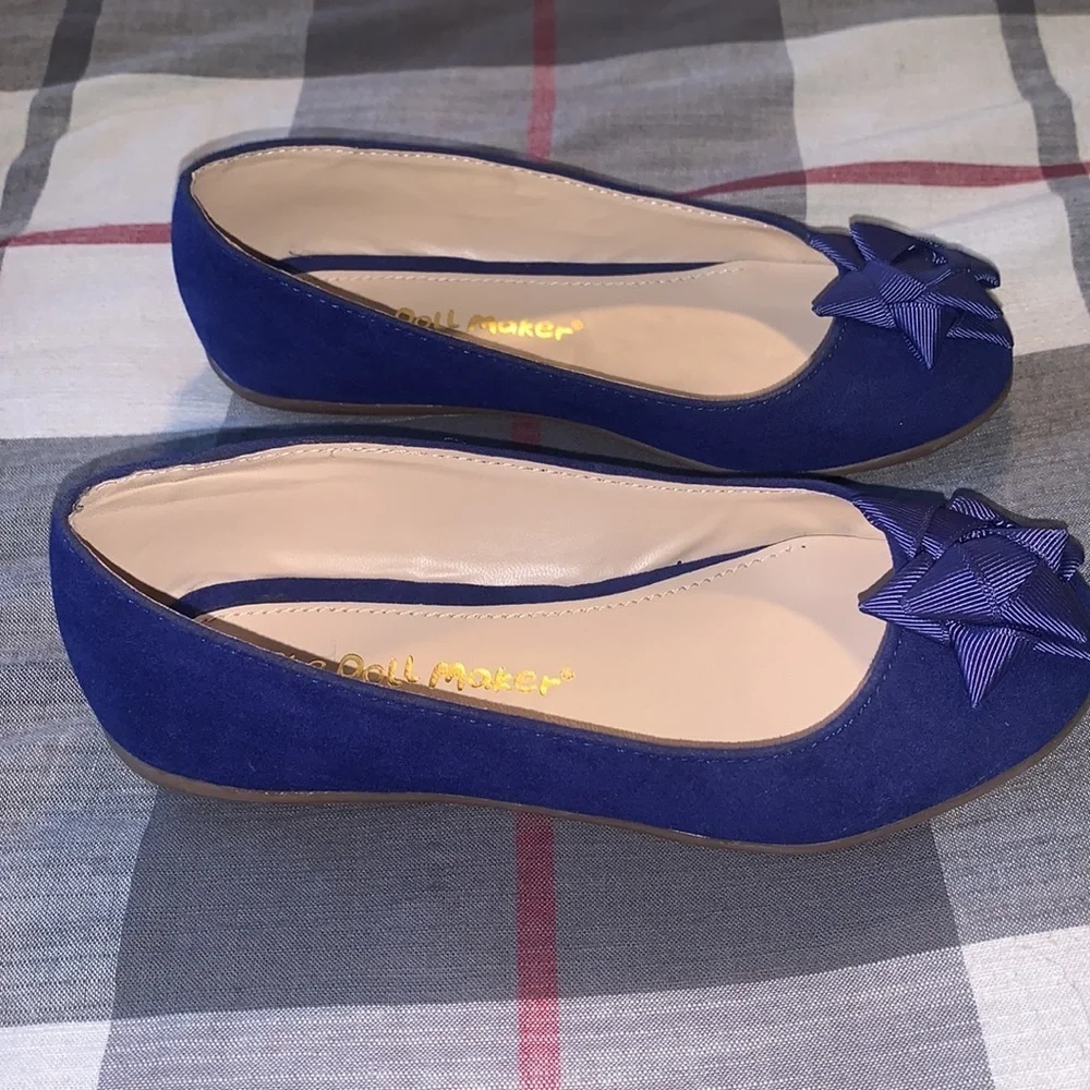 Kids shoes. The doll maker brand.